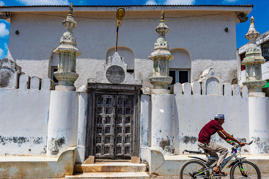 A cyclist in Lanu Town, Kenya